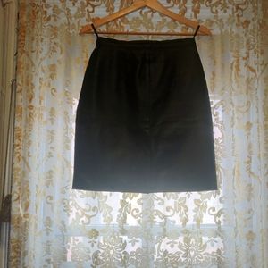 Black leather mini skirt.